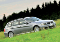BMW 335d Touring (E91) 2008–12 pictures